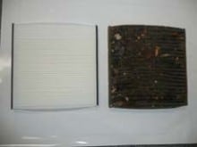 New interior cabin air filter versus one removed from vehicle.